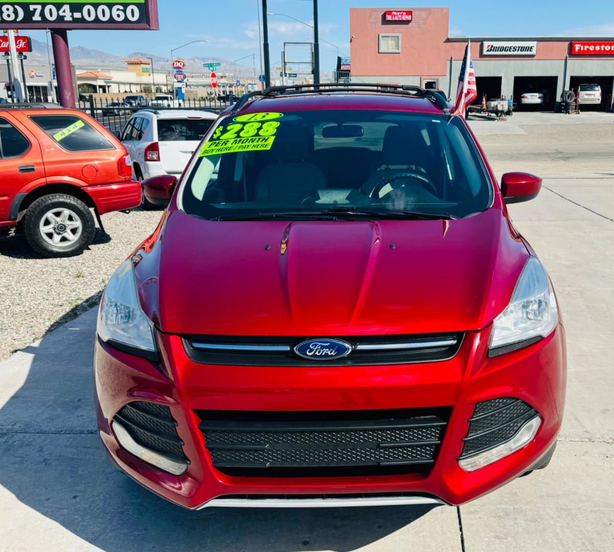 2013 Red Ford Escape (1FMCU0GX3DU) , located at 2190 Hwy 95, Bullhead City, AZ, 86442, (928) 704-0060, 0.000000, 0.000000 - Photo#2